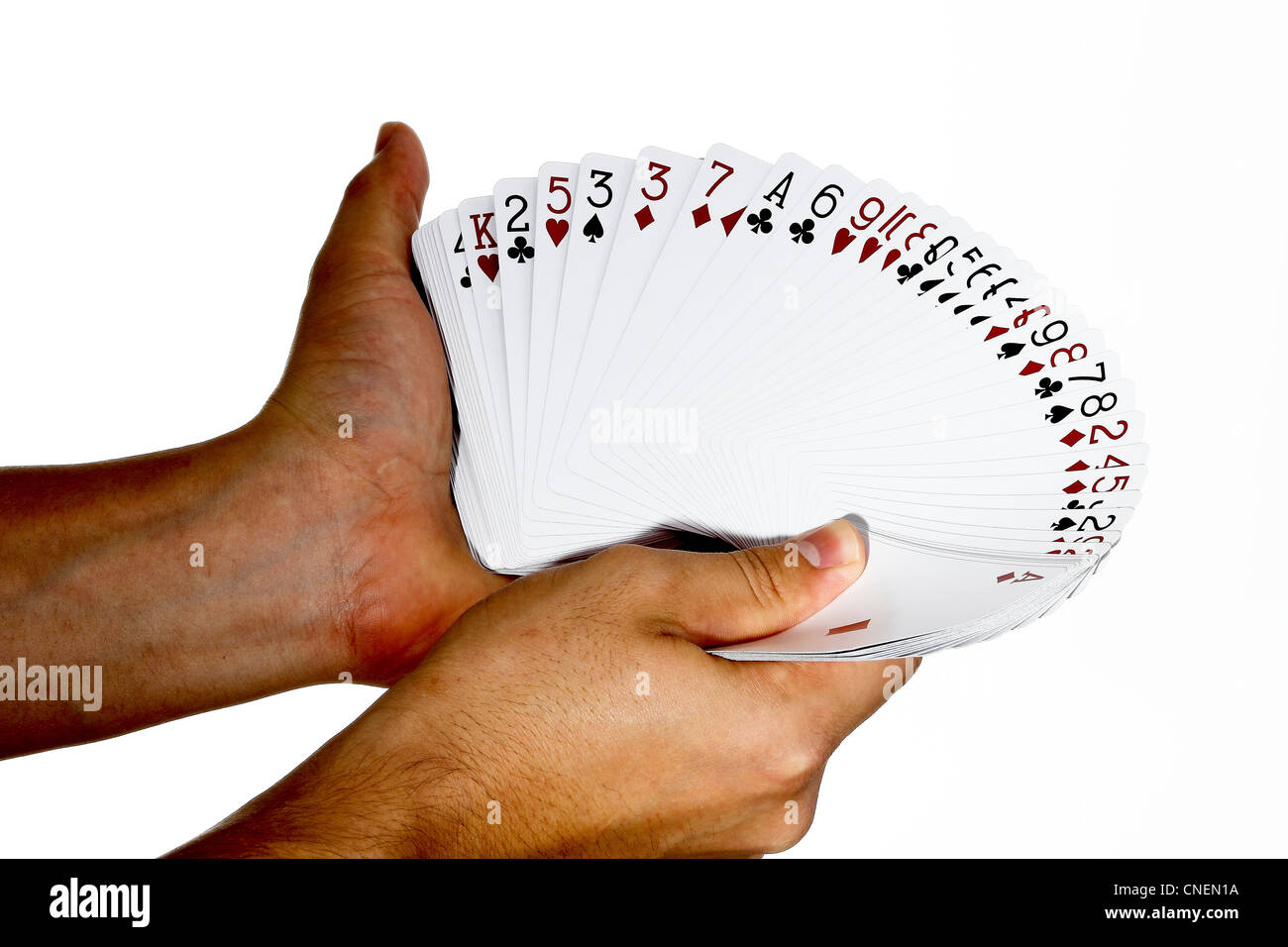 Carte da gioco in mano con la diffusione della ventola Foto Stock