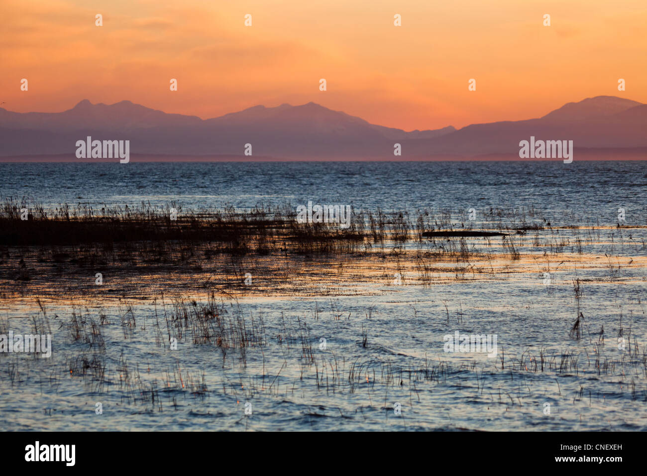Il mare e la montagna, tramonto Foto Stock