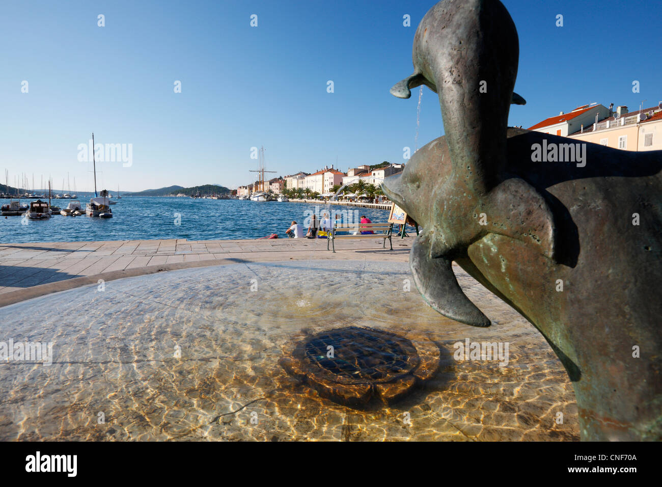 Fontana dei delfini su Mali Losinj in Croazia Foto Stock