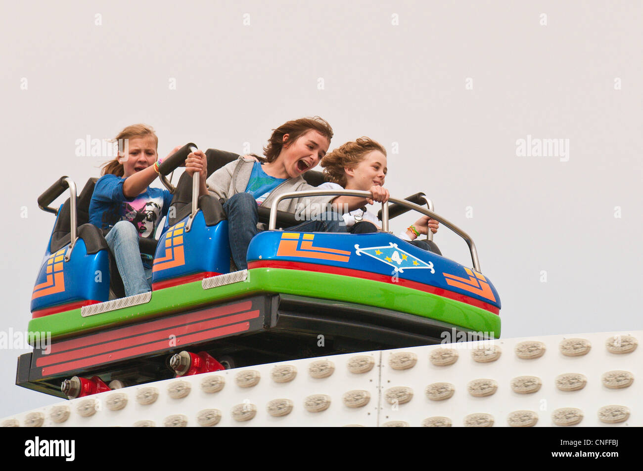 Roller Coaster ride a Stoccarda festa della birra, del Cannstatter Wasen, Stuttgart, Germania. Foto Stock
