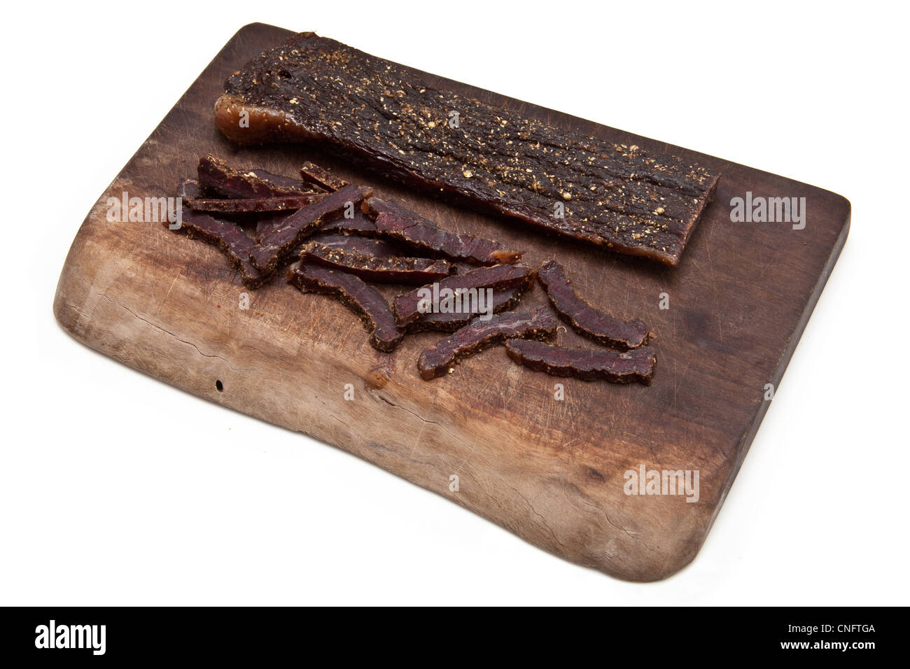 South African biltong (beef jerky) isolato su sfondo bianco Foto Stock