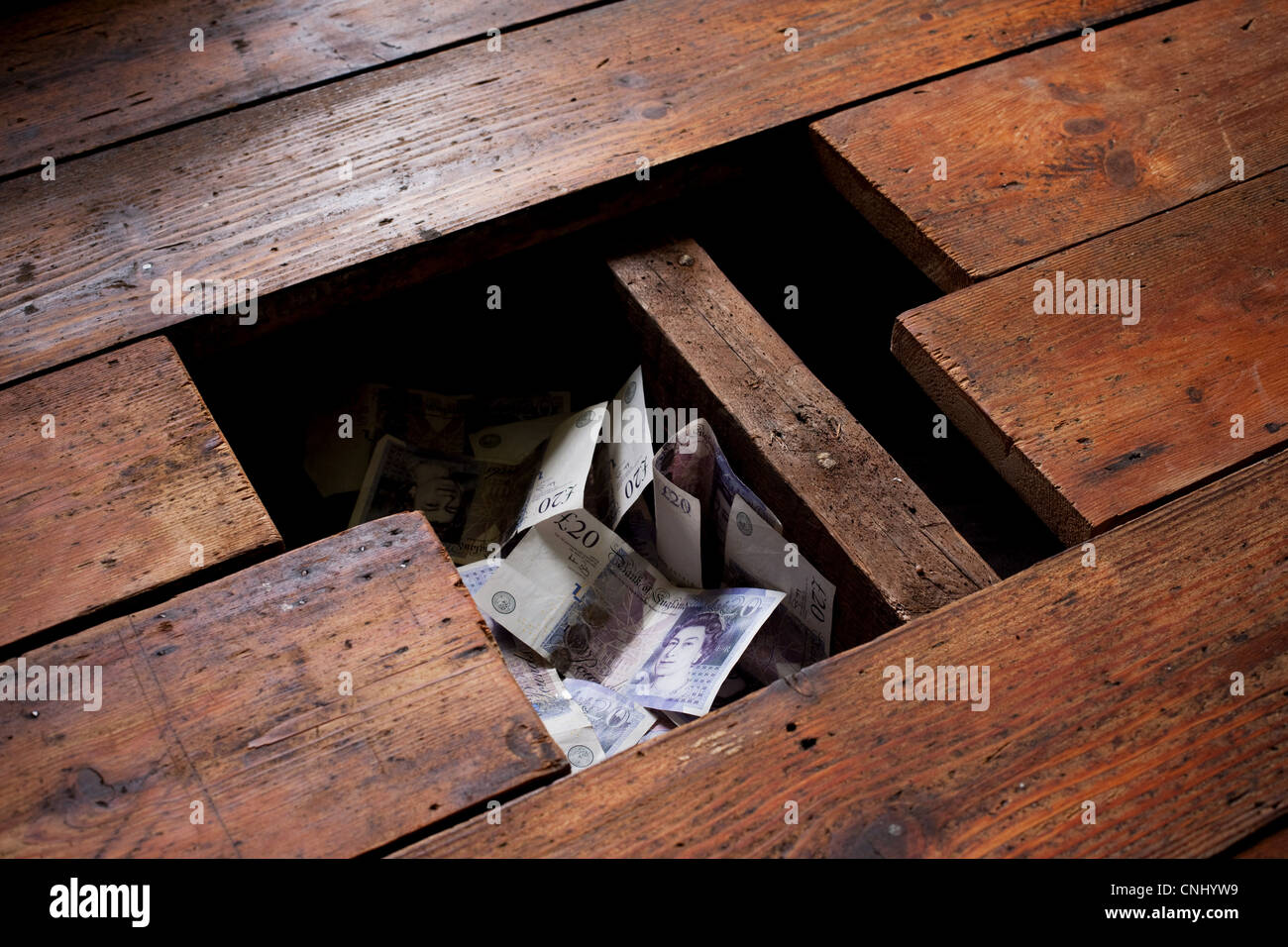 Il denaro sotto tavoloni Foto Stock