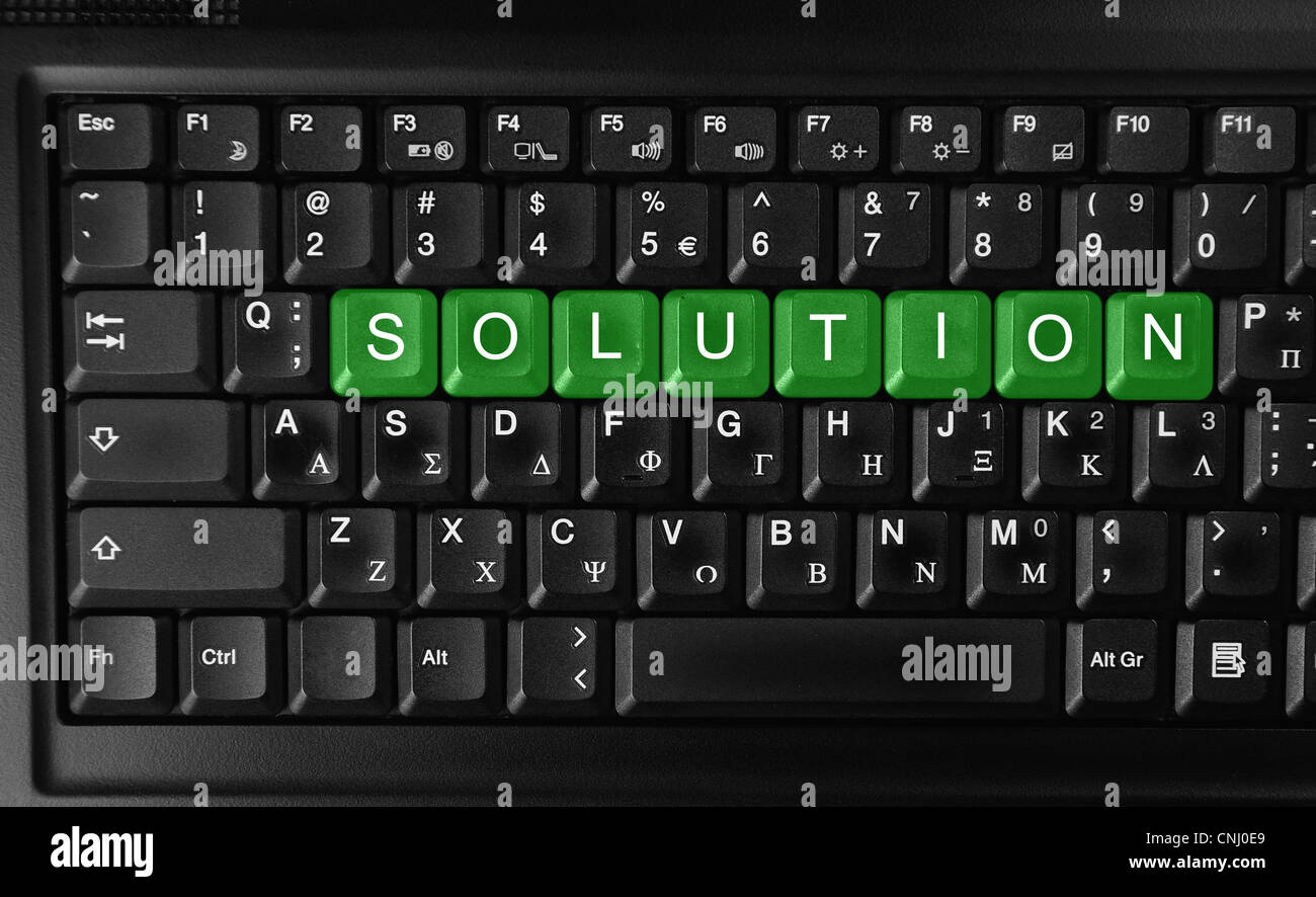 Parola di soluzione verde sul pulsante Tastiera. Foto Stock