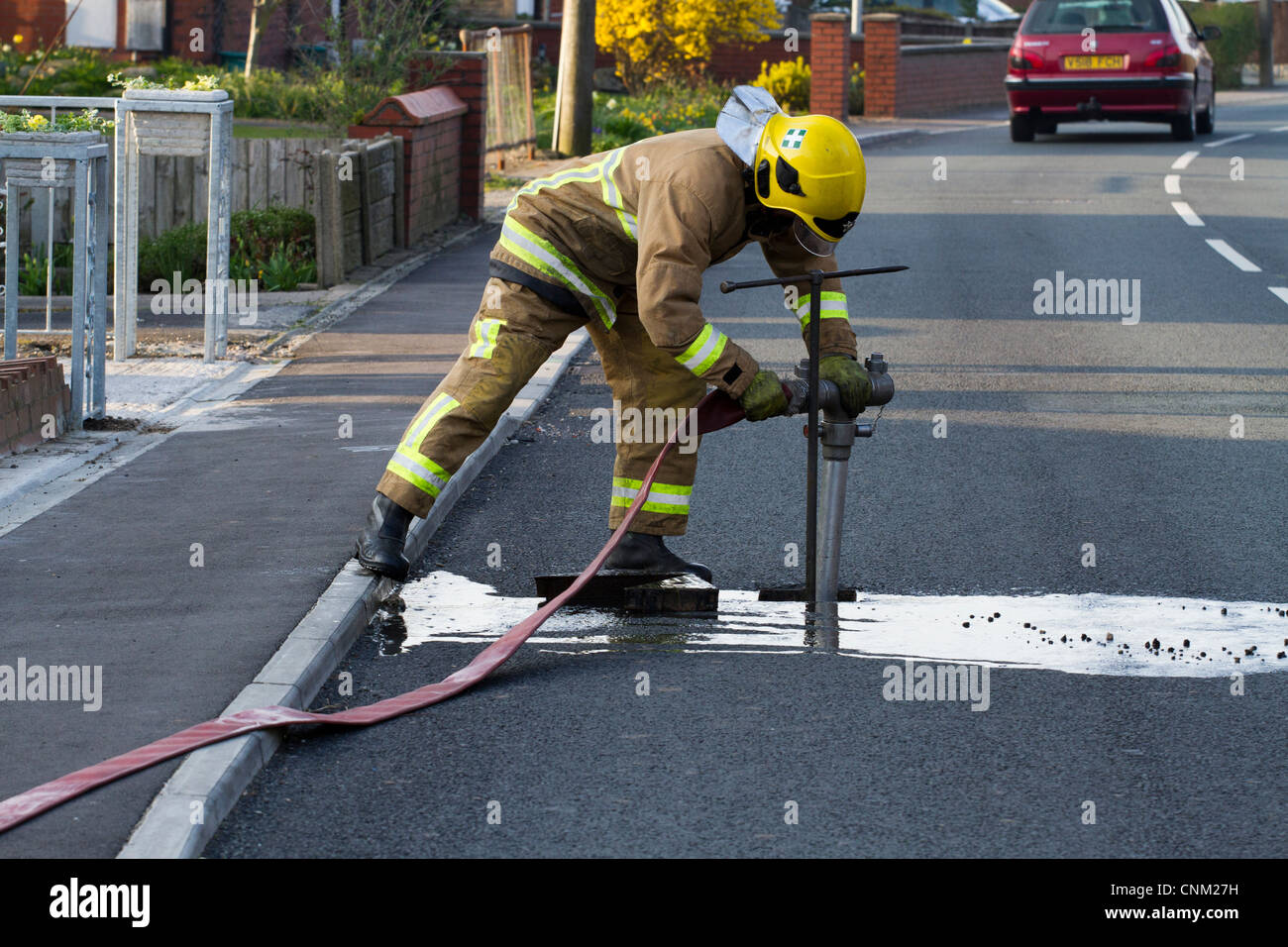 I vigili del fuoco e dei bandi di gara che frequentano incidente, New Lane ritmo, Southport, Merseyside, Regno Unito Foto Stock