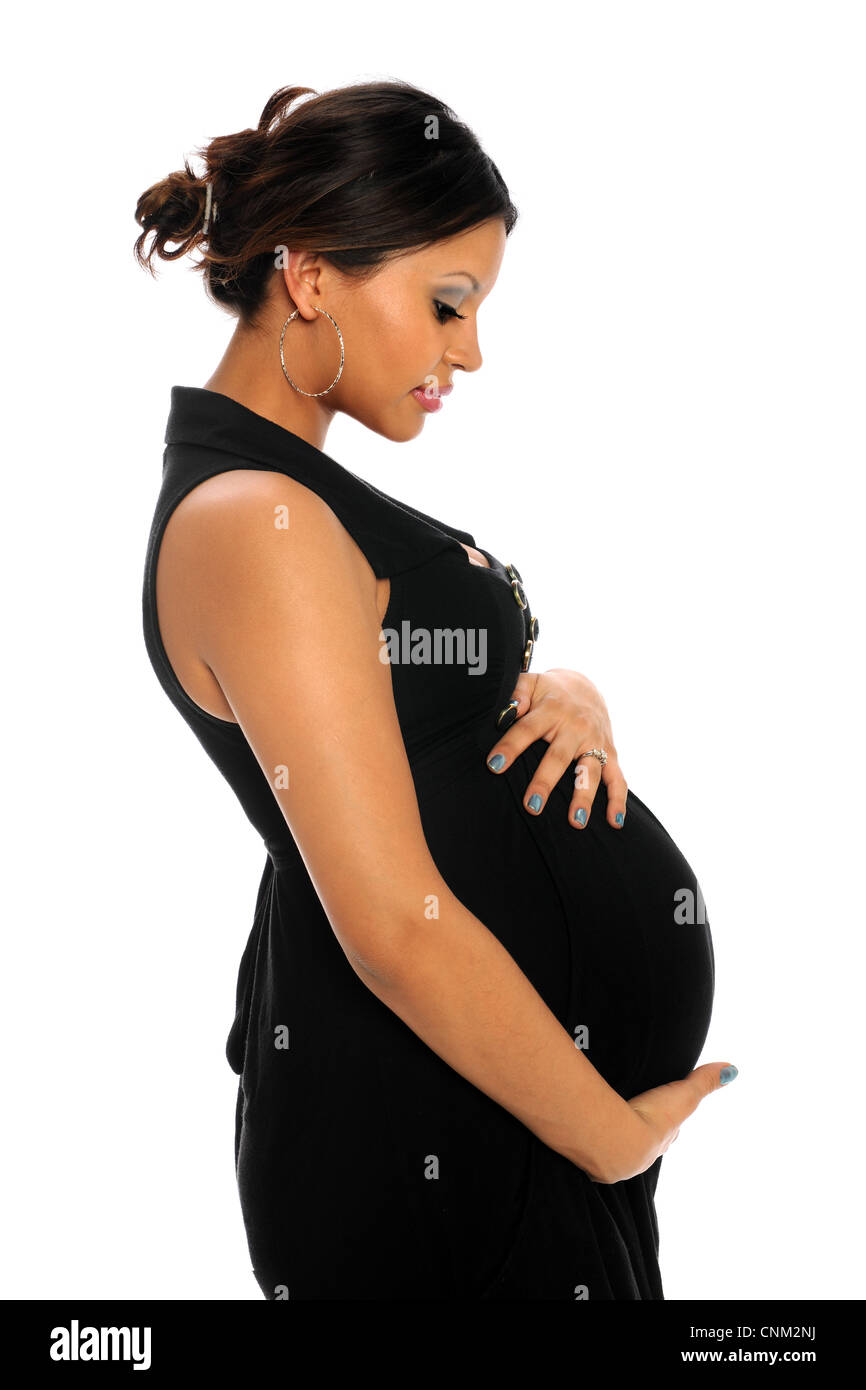 Ritratto di profilo di ispanico donna incinta isolate su sfondo bianco Foto Stock