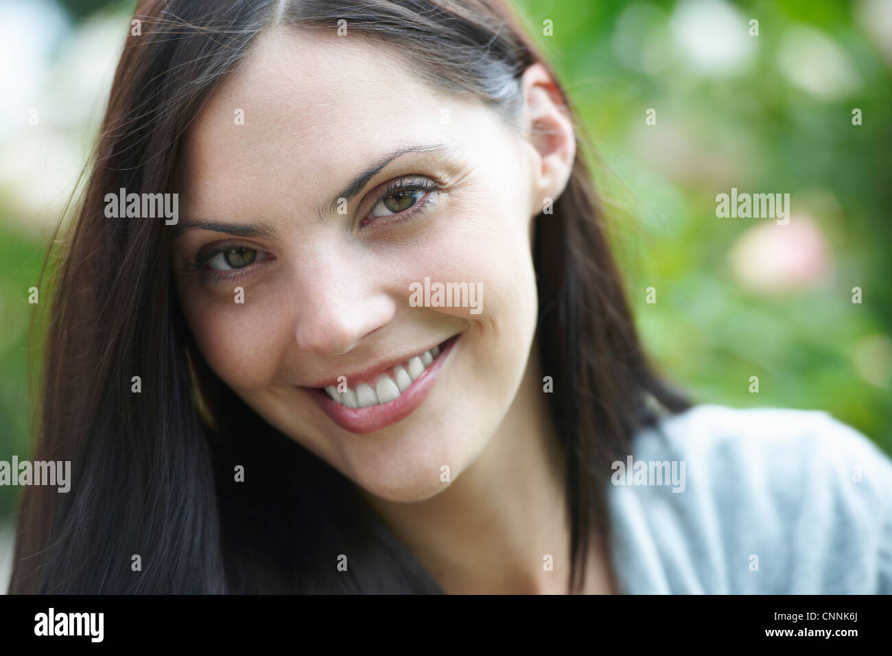 Close up di donna faccia sorridente Foto Stock