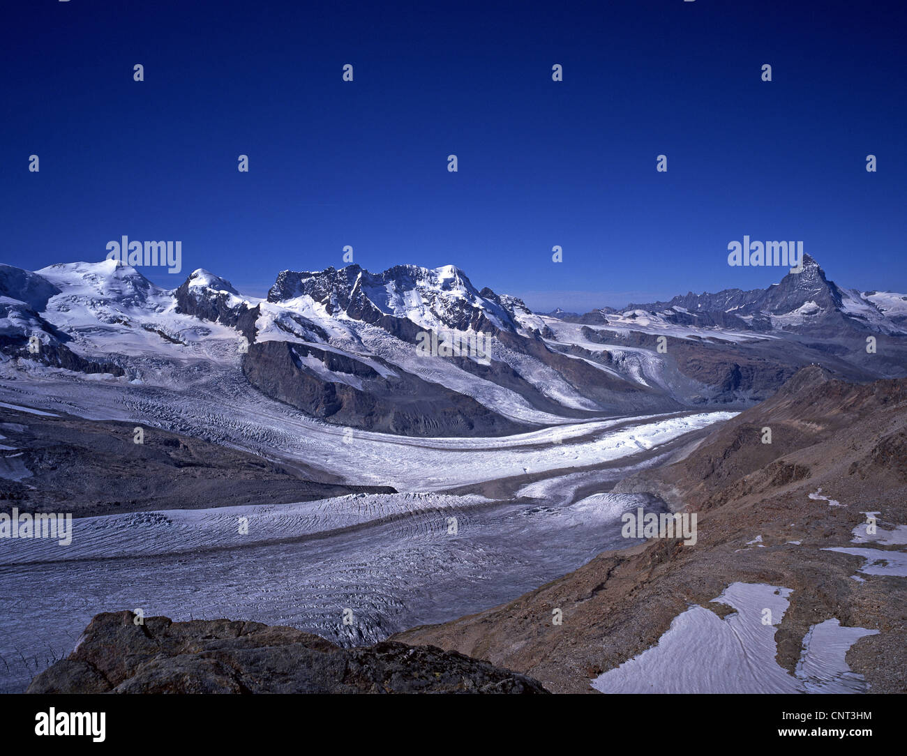 Twin montagne Breithorn e Cervino con ghiacciaio Gorner, Svizzera Vallese, Alpi Foto Stock