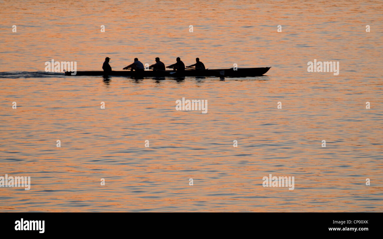 I canottieri al tramonto Foto Stock