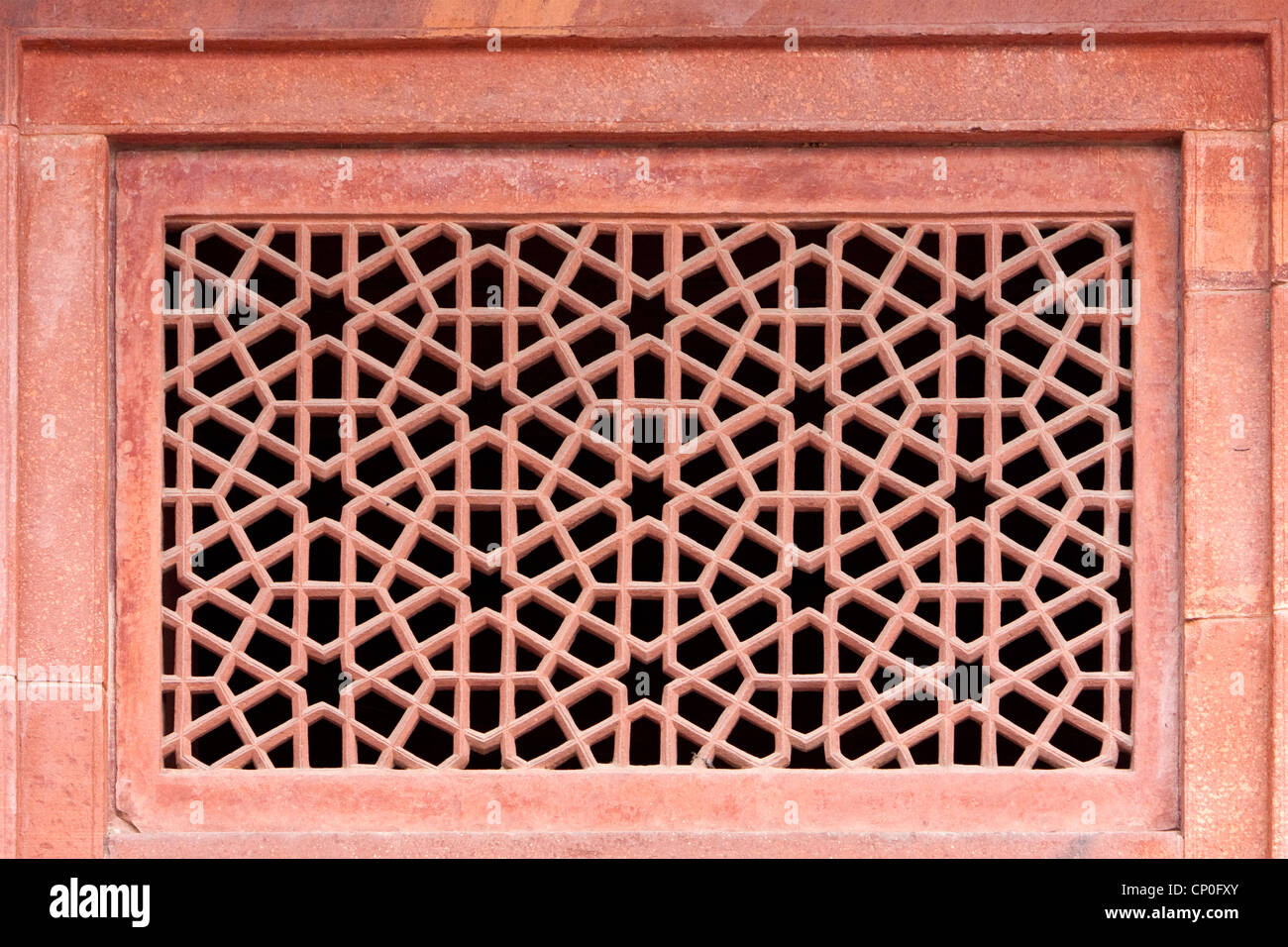 Fatehpur Sikri, Uttar Pradesh, India. Geometrico Design islamico con esagoni nella finestra Laticework. Foto Stock