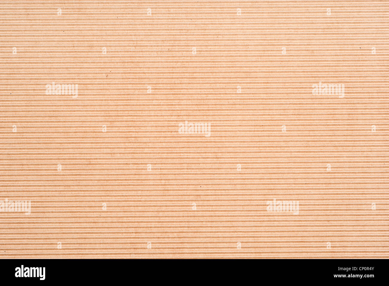 Il lato di una scatola di cartone ondulato per uso come elemento di design o di sfondo. Foto Stock