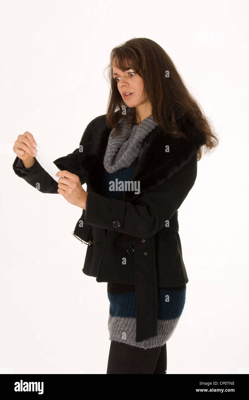 Donna elegante con fattura Foto Stock