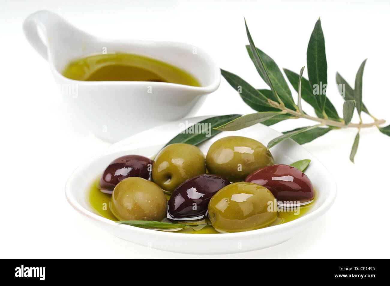 Olive fresche in olio extra vergine di oliva Foto Stock