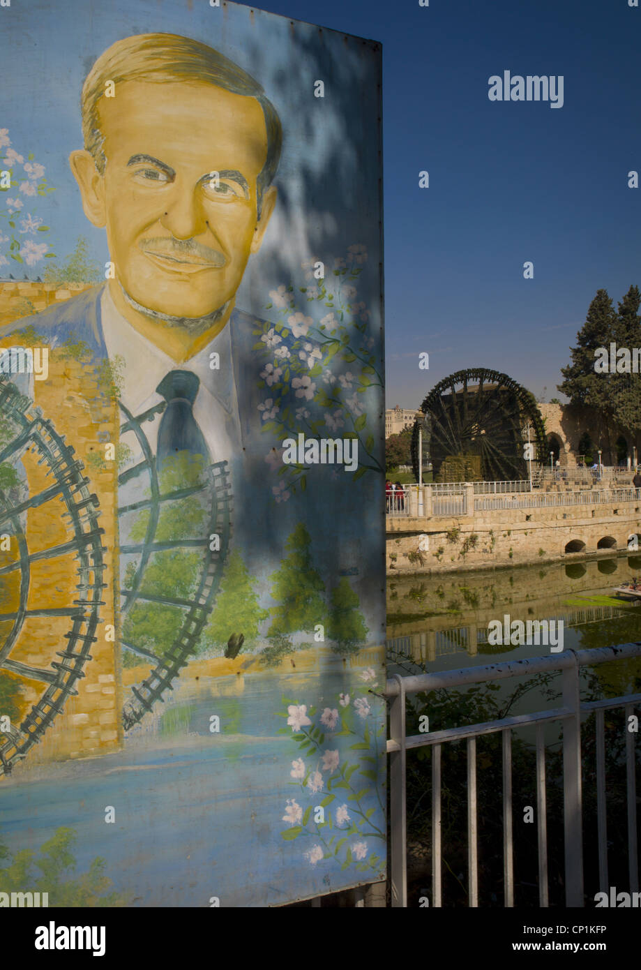Hafez al Assad Poster in parte anteriore del Norias di Bechriyyat, Hama, Siria Foto Stock