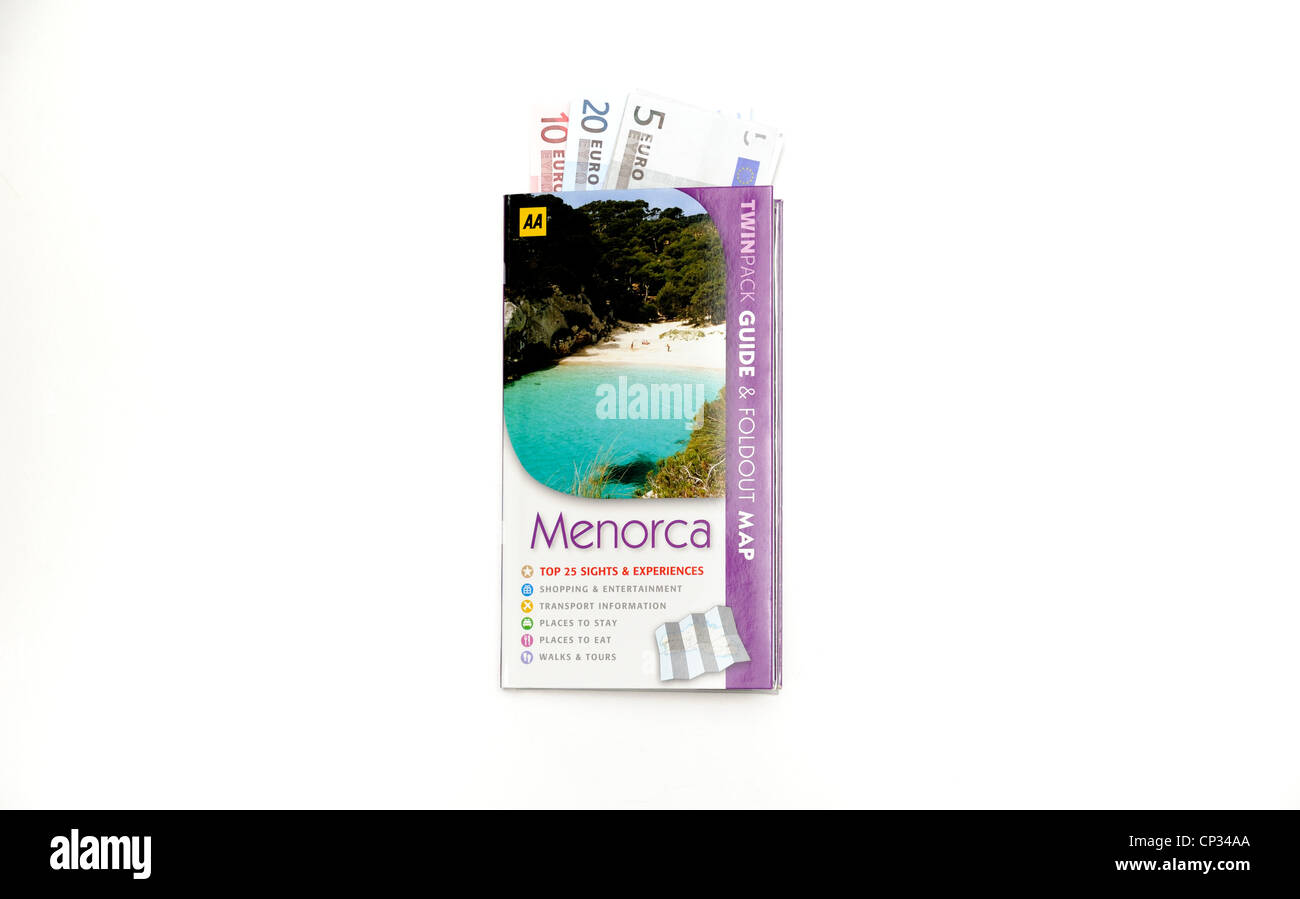 AA guida turistica di Minorca con una selezione di banconote in euro all'interno Foto Stock