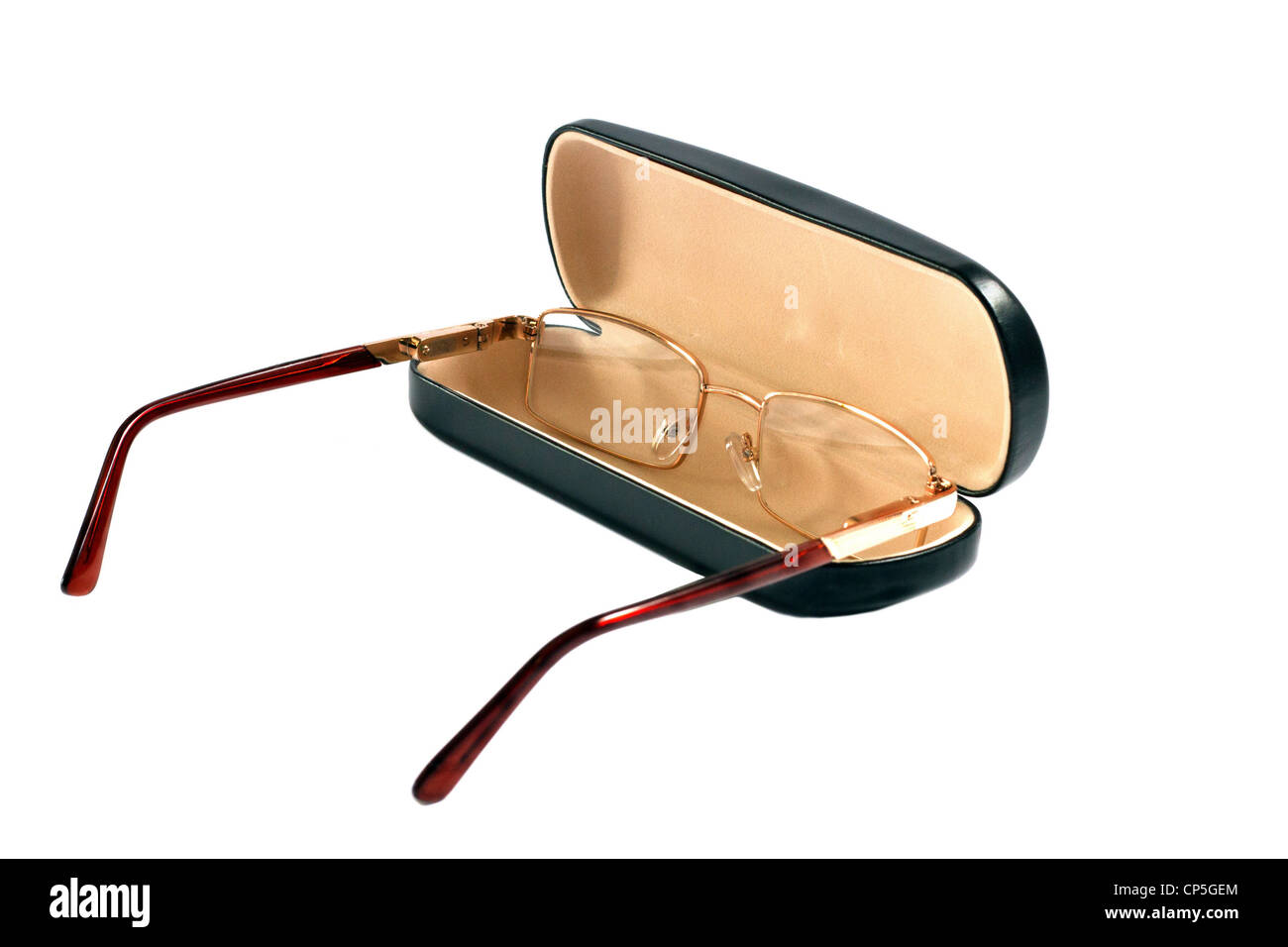 Un bicchieri di colore dorato e caso per loro Foto Stock