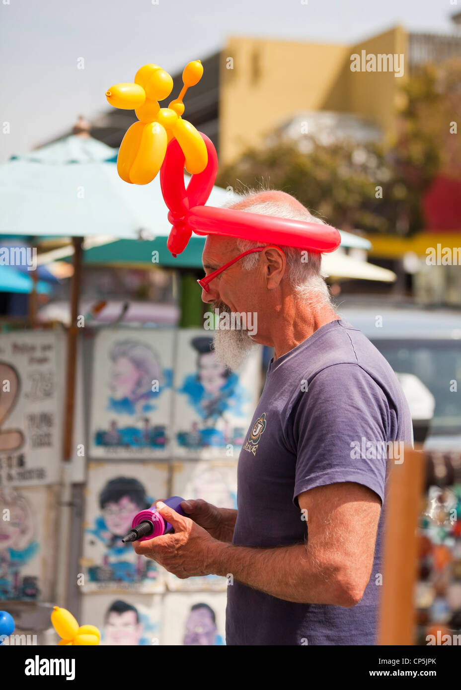 Uomo di palloncino con palloncino hat Foto Stock