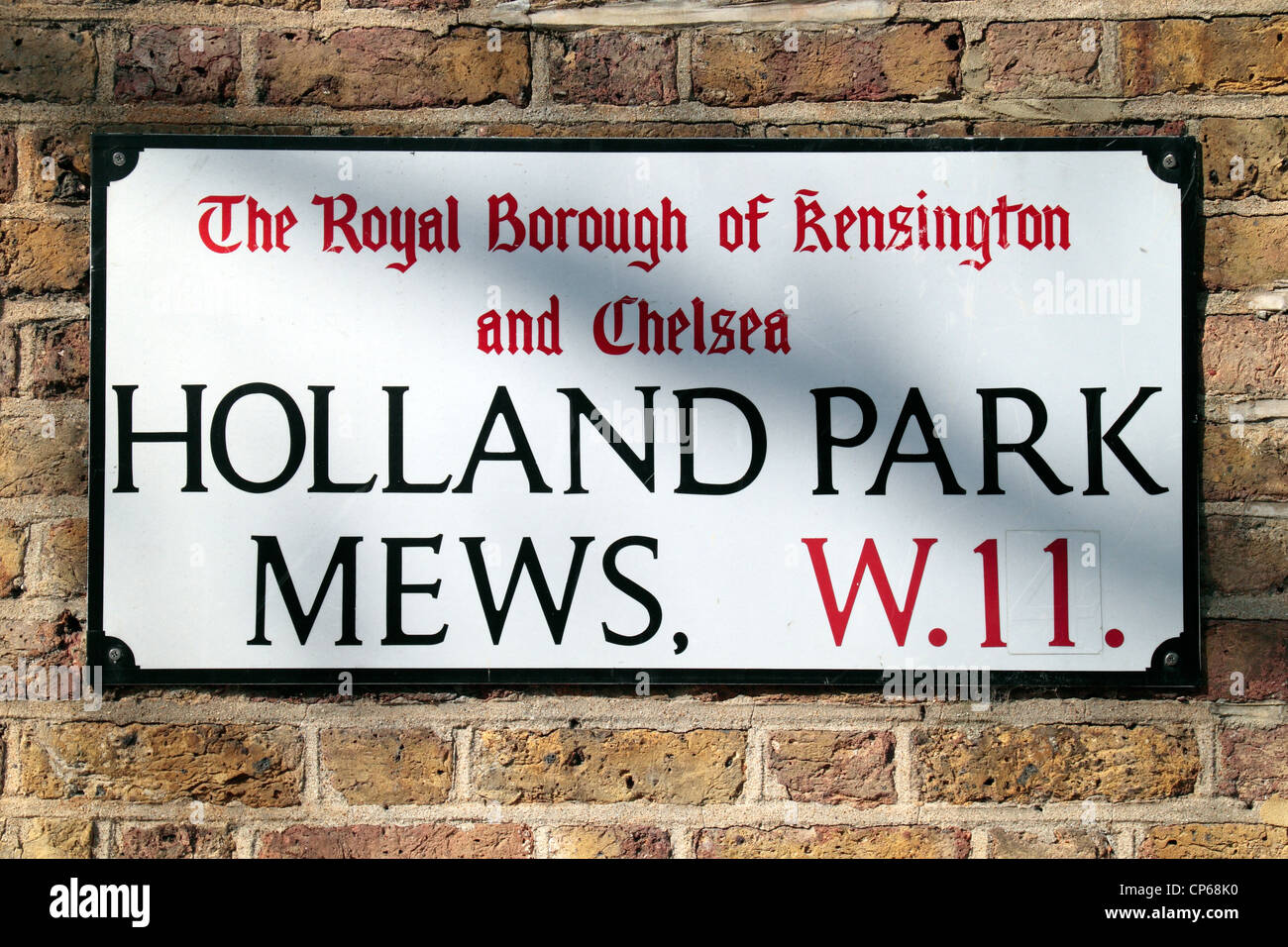 Un cartello stradale per Holland Park Mews W11 nel Royal Borough di Kensington e Chelsea, Londra, Regno Unito. Marzo 2012 Foto Stock
