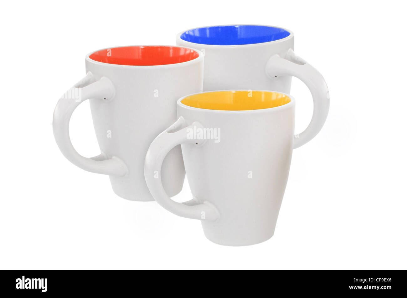 Tre tazze multicolori, isolato su bianco Foto Stock