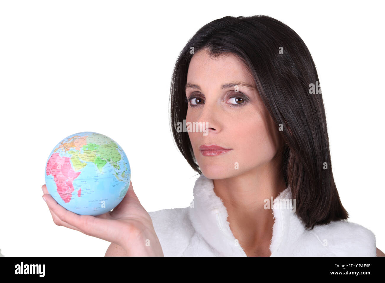 Donna con globo in mano Foto Stock