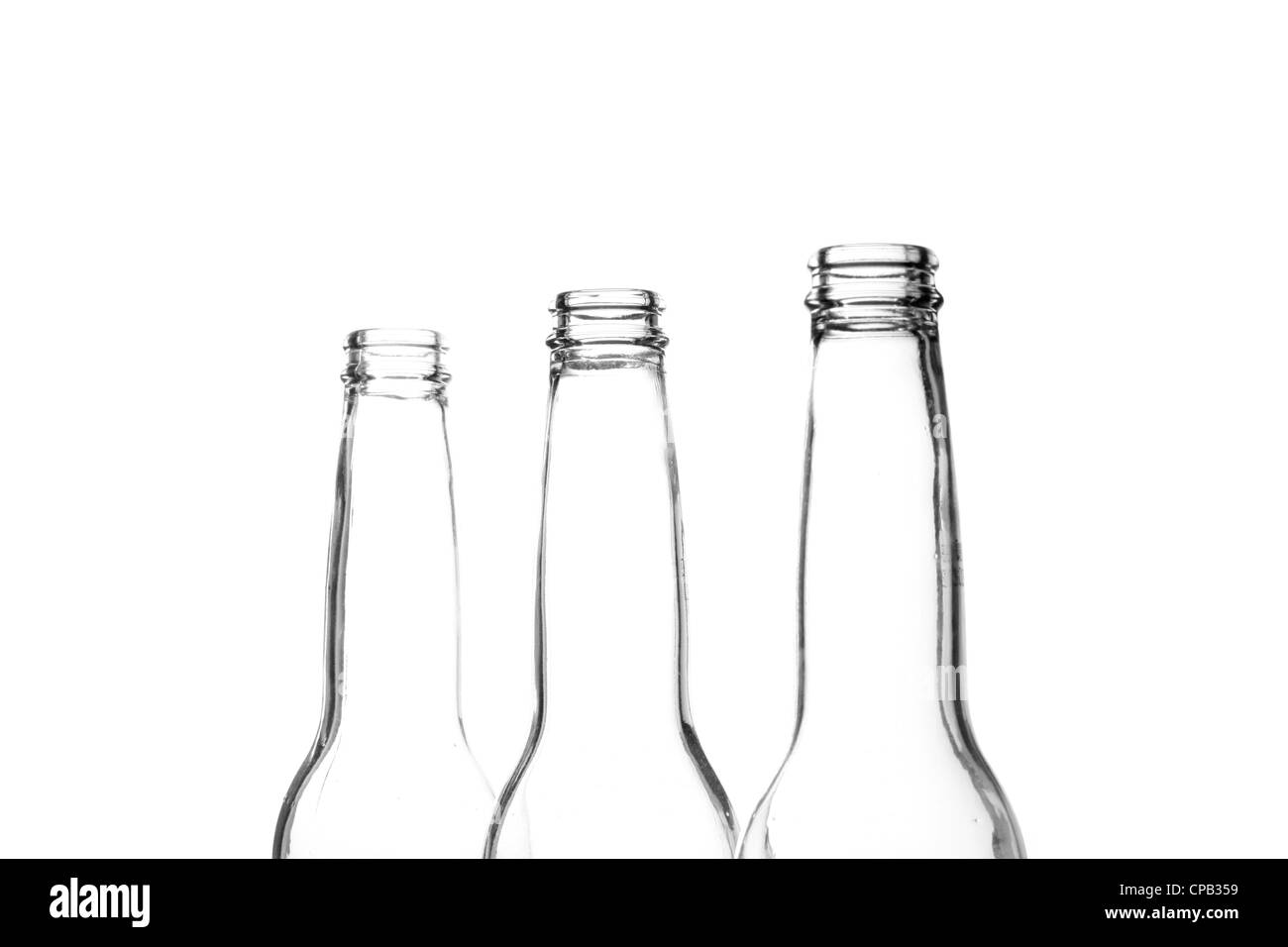 Birra tre colli di bottiglia su bianco Foto Stock