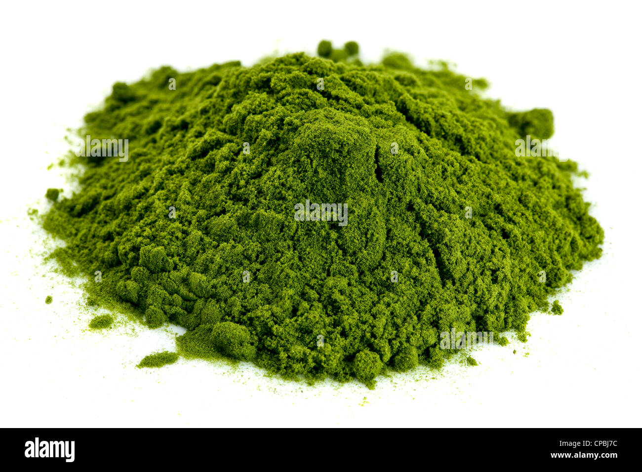 Piccolo mucchio di verde liofilizzato organici di erba di frumento polvere, supplemento nutrizionale Foto Stock