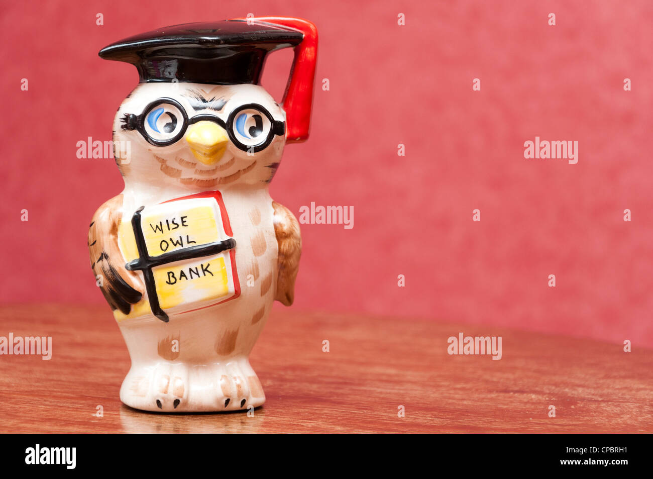 Il Gufo Sapiente denaro risparmio bancario. Foto Stock