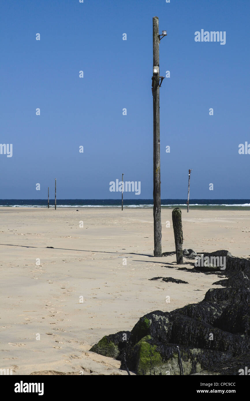 Lelant sands Cornwall Cornish Beach di St Ives Bay navigazione pali della luce per Hayle harbour bassa marea Foto Stock
