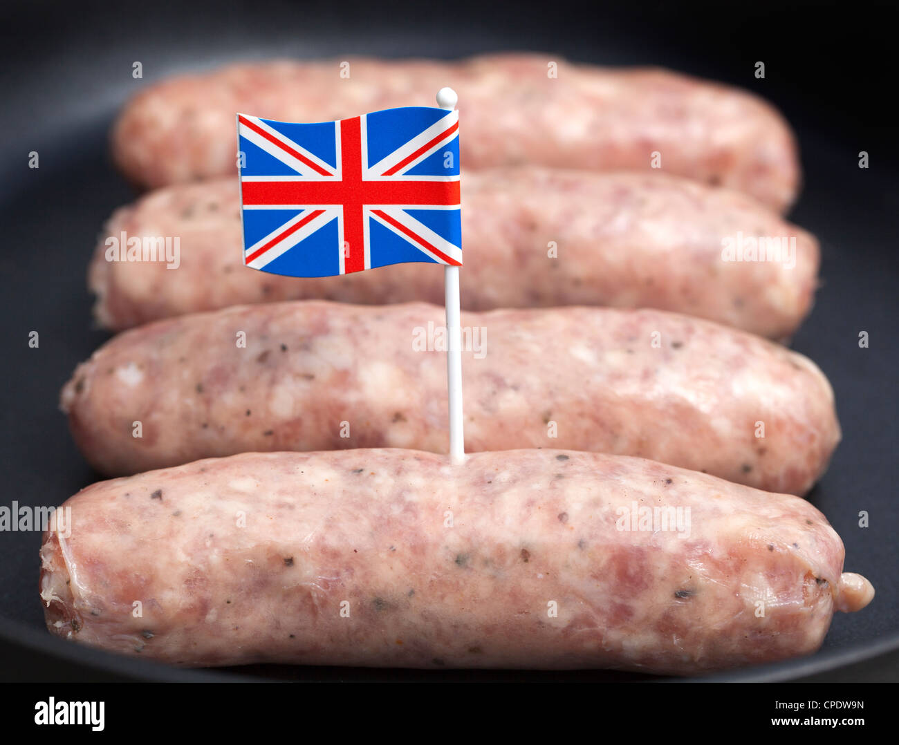 British tradizionale salsiccia di maiale con Union Jack Flag Foto Stock