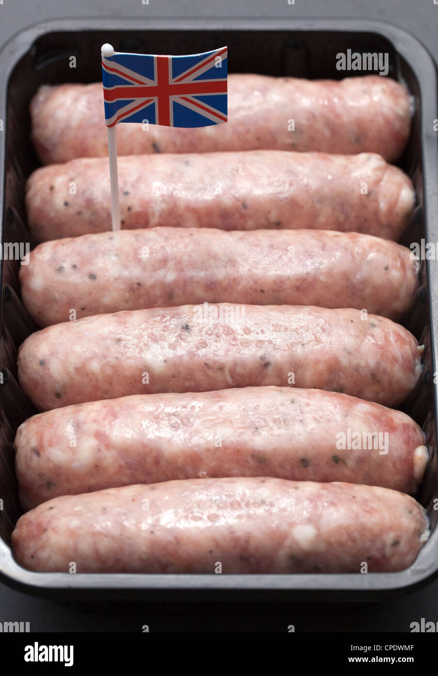 British tradizionale salsiccia di maiale con Union Jack Flag Foto Stock