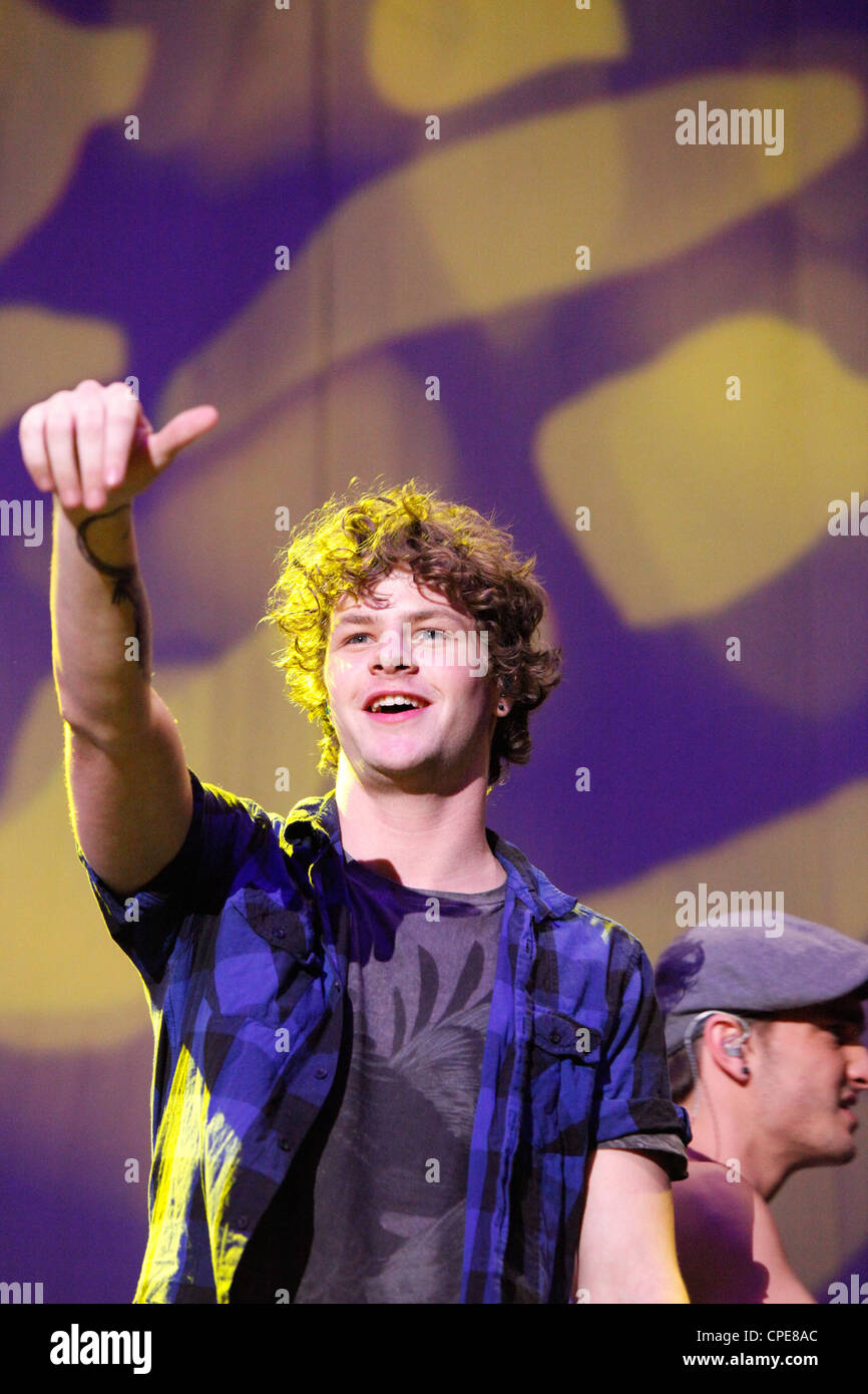 Jay McGuiness della boyband volevano esegue sul palco a Birmingham LG Arena all'BRMB concerto dal vivo nel 2010. Foto Stock