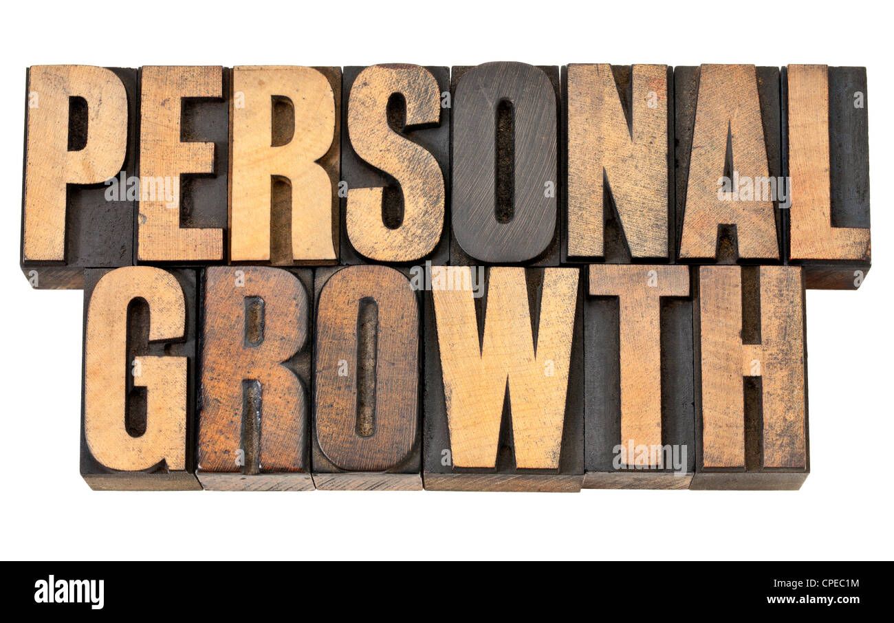 Crescita personale - Self development concept - Testo isolato in rilievografia vintage tipo legno Foto Stock