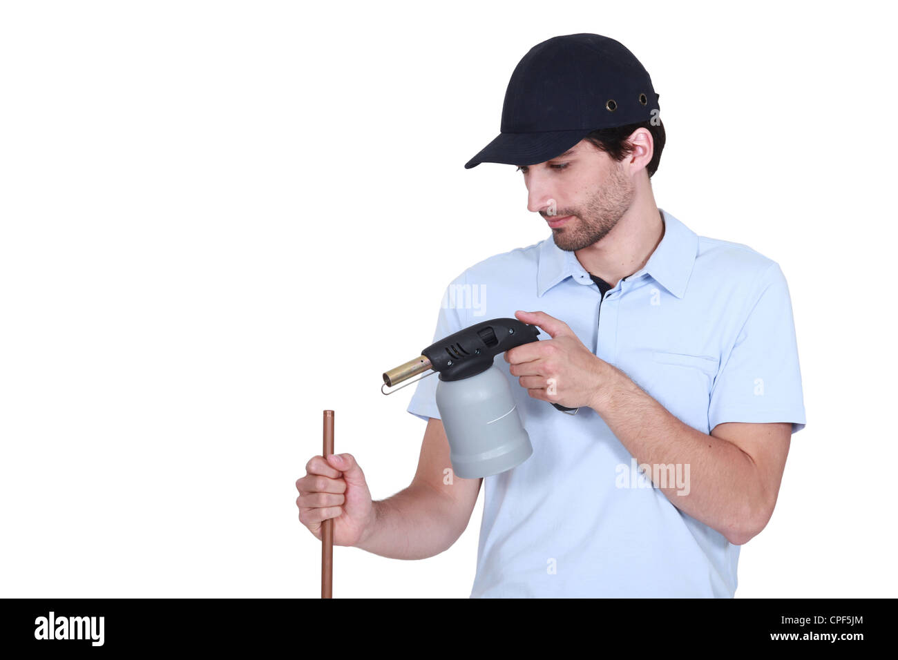 Plumber tubo di riscaldamento con blow-torcia Foto Stock