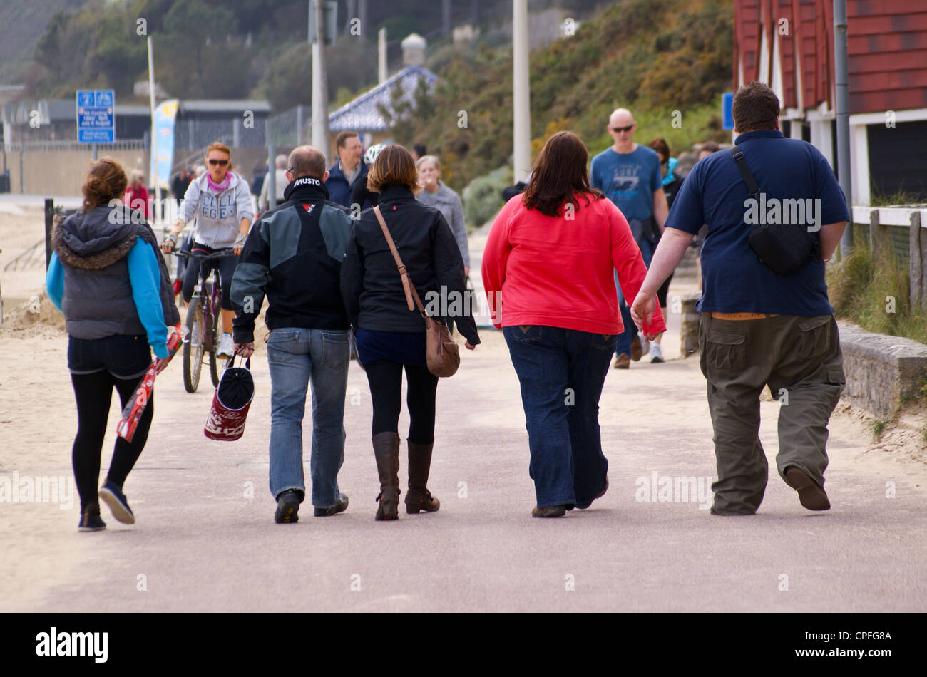 Fat gente sulla spiaggia, Bournemouth, Inghilterra Foto Stock