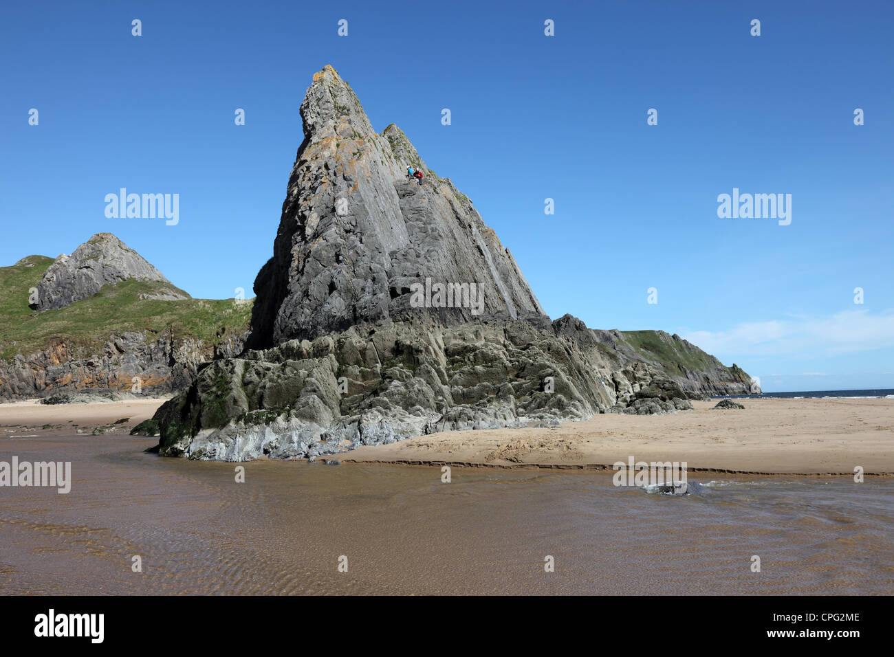 Pinnacolo di roccia Three Cliffs Bay Penisola di Gower South Wales UK Foto Stock