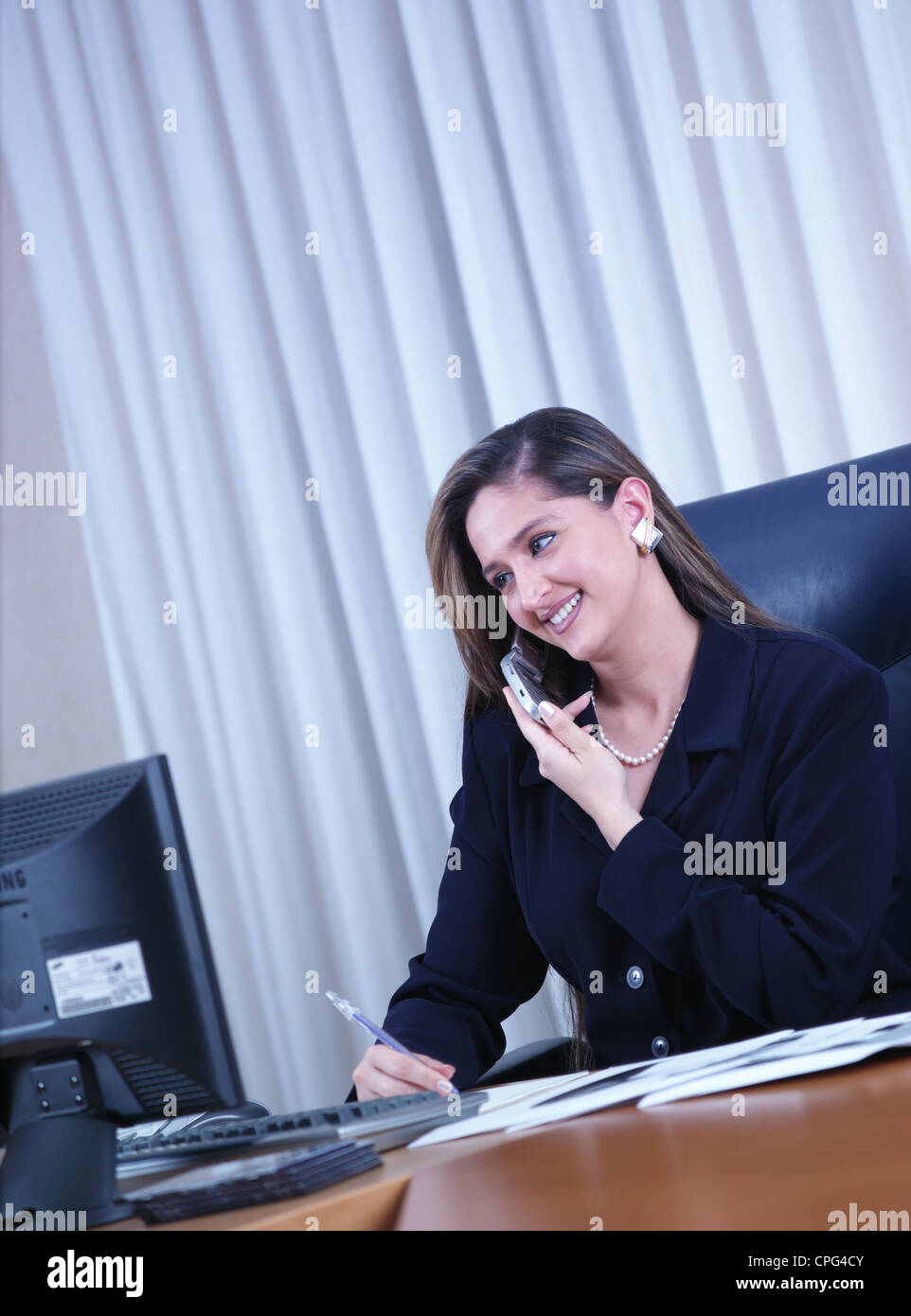 Business donna al telefono Foto Stock