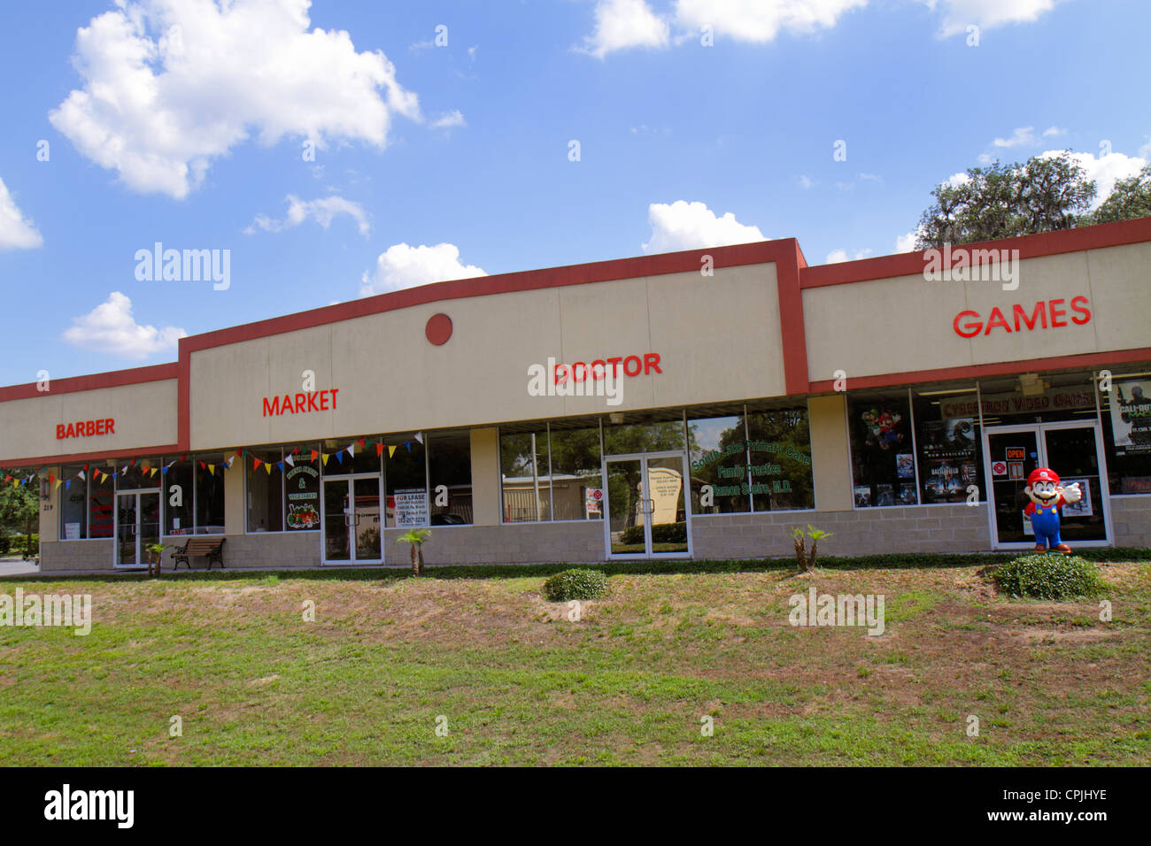 Clermont Florida, barbiere mercato dottori giochi, edificio, aziende, quartiere, piccola città, strip Mall, edificio commerciale, visitatori viaggio t Foto Stock