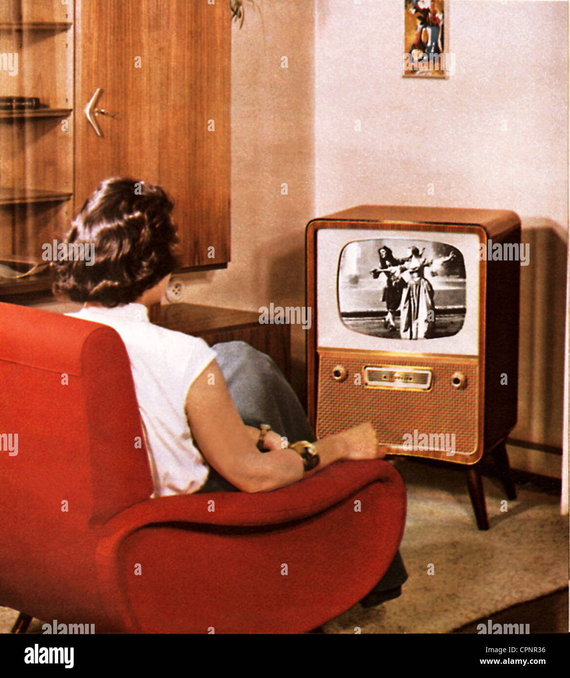 Televisione,televisione,spettatore,Telefunken televisore autonomo FE 14/43 St. Con Visiomatic,telaio: Legni esotici,lucido,con cornice decorata in noce,cinescopio 43 centimetro,prezzo originale 1957: DM 948,Germania,1957,pubblicità,monocromo,sistemi di tubi,televisione a tubo,donna,donna,donna,seduta,sedia,sedia televisiva,50,spettatore televisivo,telespettatori,programma televisivo,programma TV-a-consumo,programmi TV-non-a-standard,programmi TV-a-standard,programmi TV-a-standard,programmi TV-a-TV-standard-TV-a-standard,programmi TV-TV-a-standard-TV-TV-TV-a-TV Foto Stock