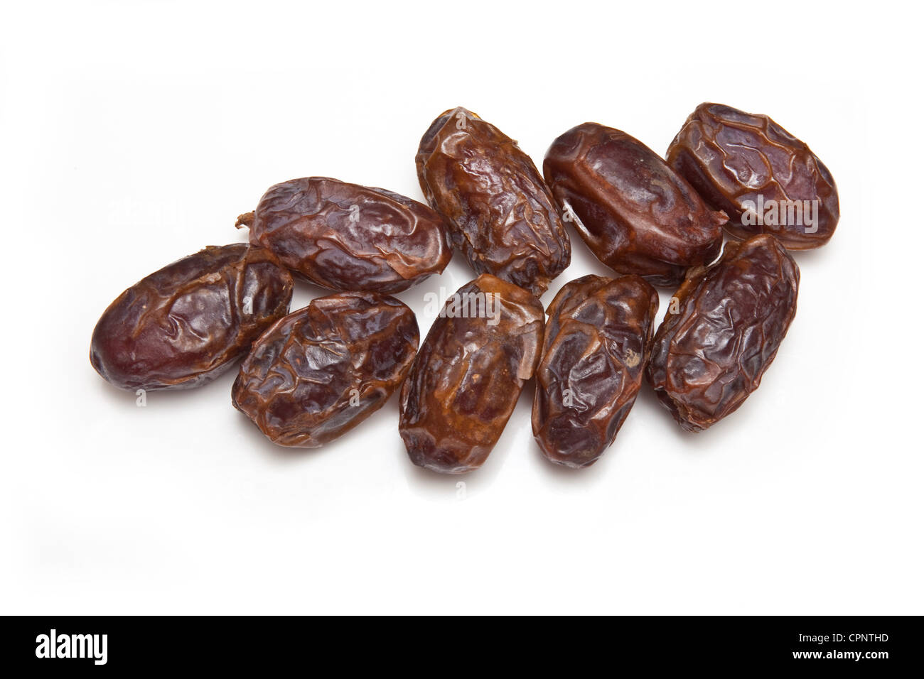 Essiccato Medjool date isolato su un bianco di sfondo per studio. Foto Stock