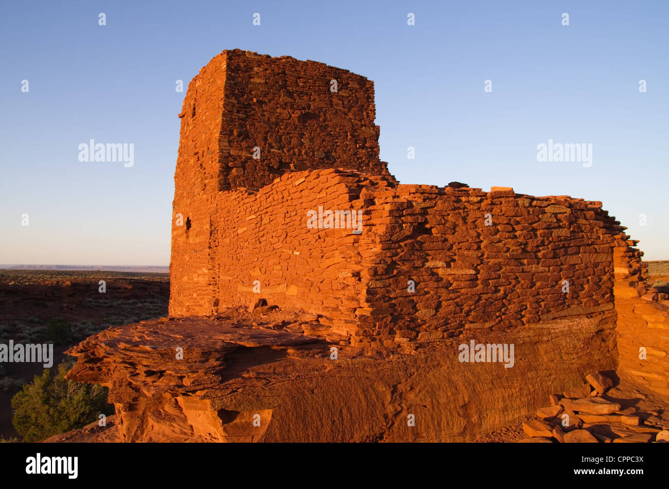 Wukoki rovine di Wupatki National Monument in golden luce della sera Foto Stock