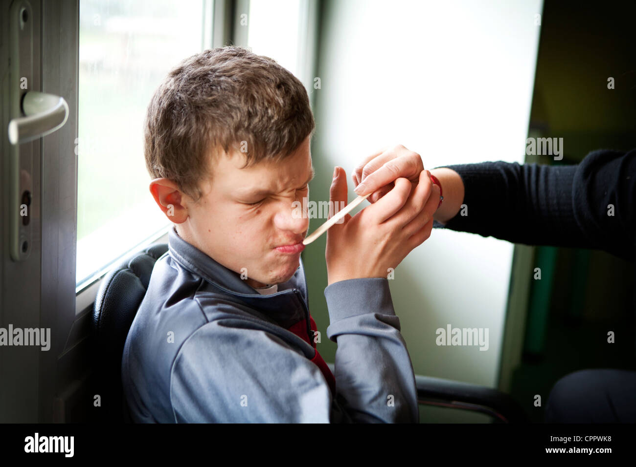 BAMBINO AUTISTICO Foto Stock