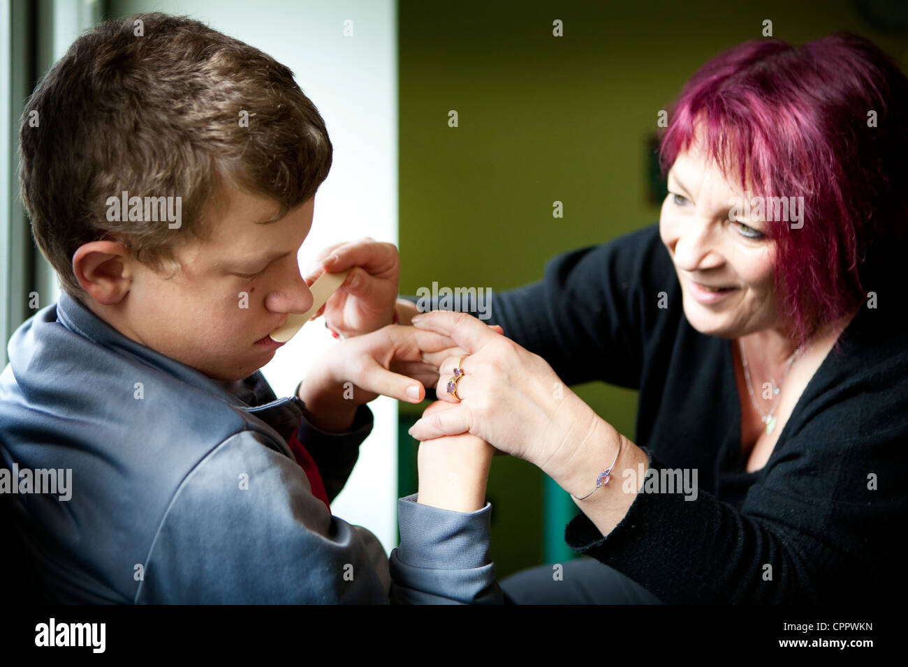 BAMBINO AUTISTICO Foto Stock