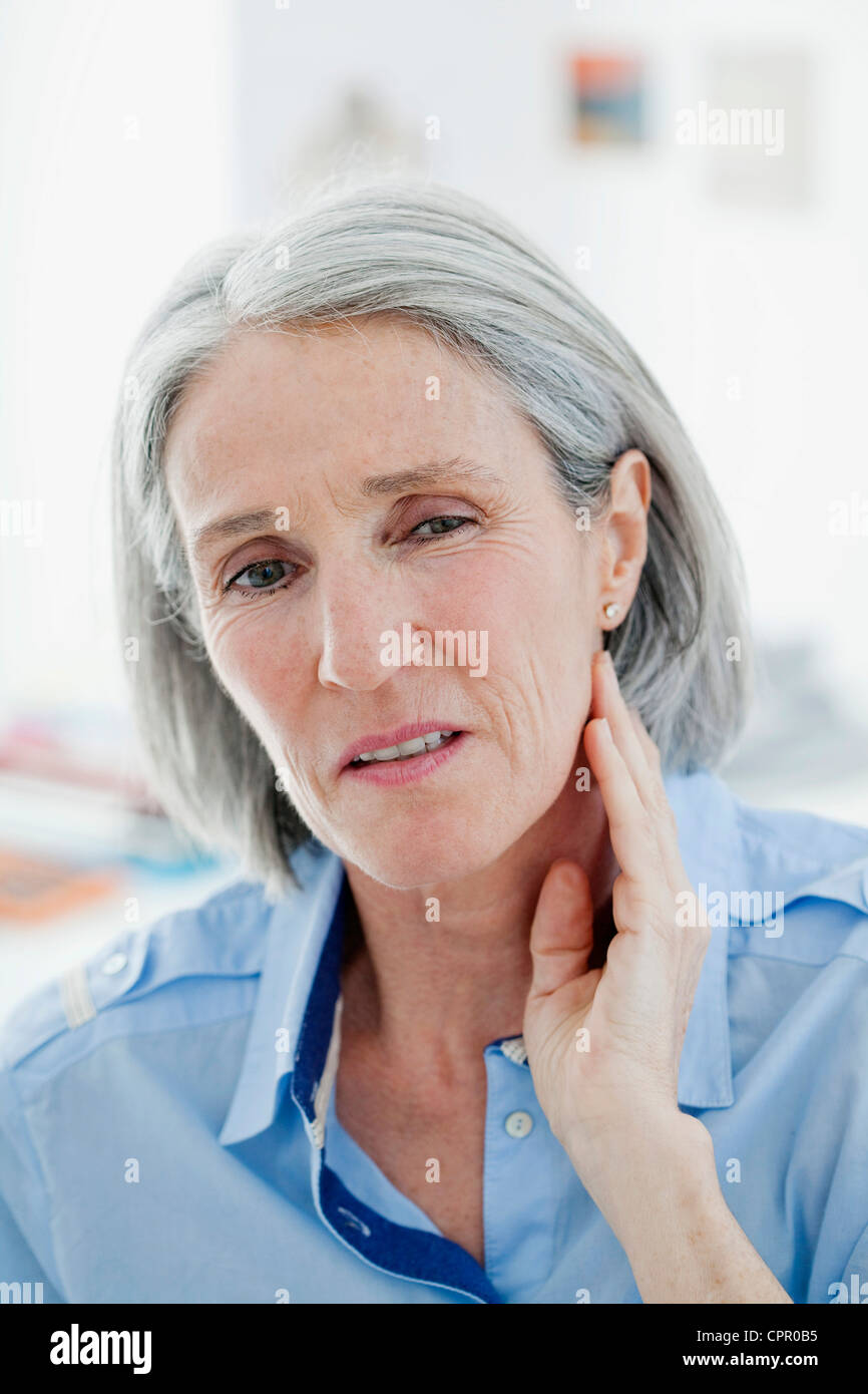 Persona anziana con un mal di denti Foto Stock