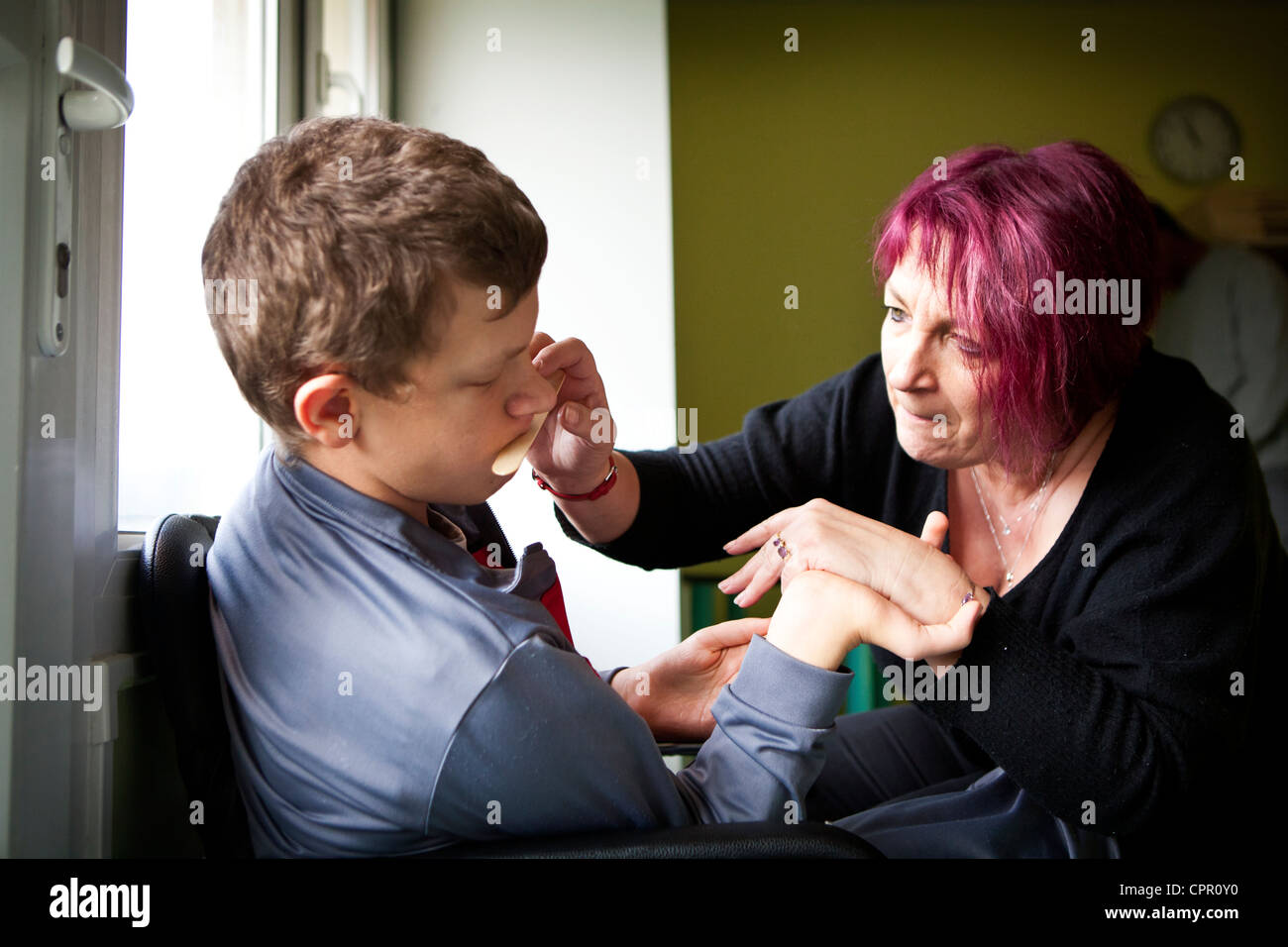 BAMBINO AUTISTICO Foto Stock