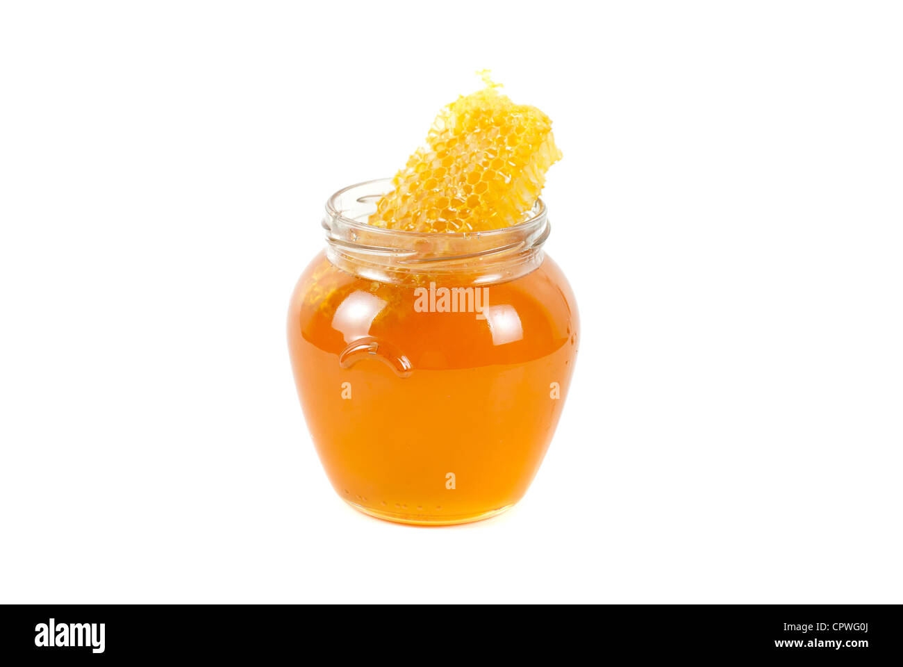 Un vasetto di miele biologico su sfondo bianco Foto Stock