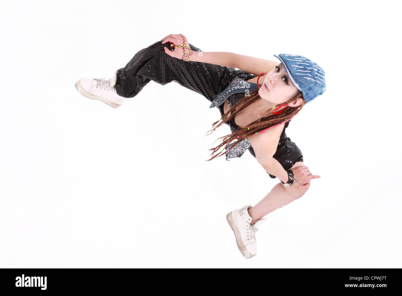 Ragazza carina in vari costumi di ballo e divertimento pone. Foto Stock