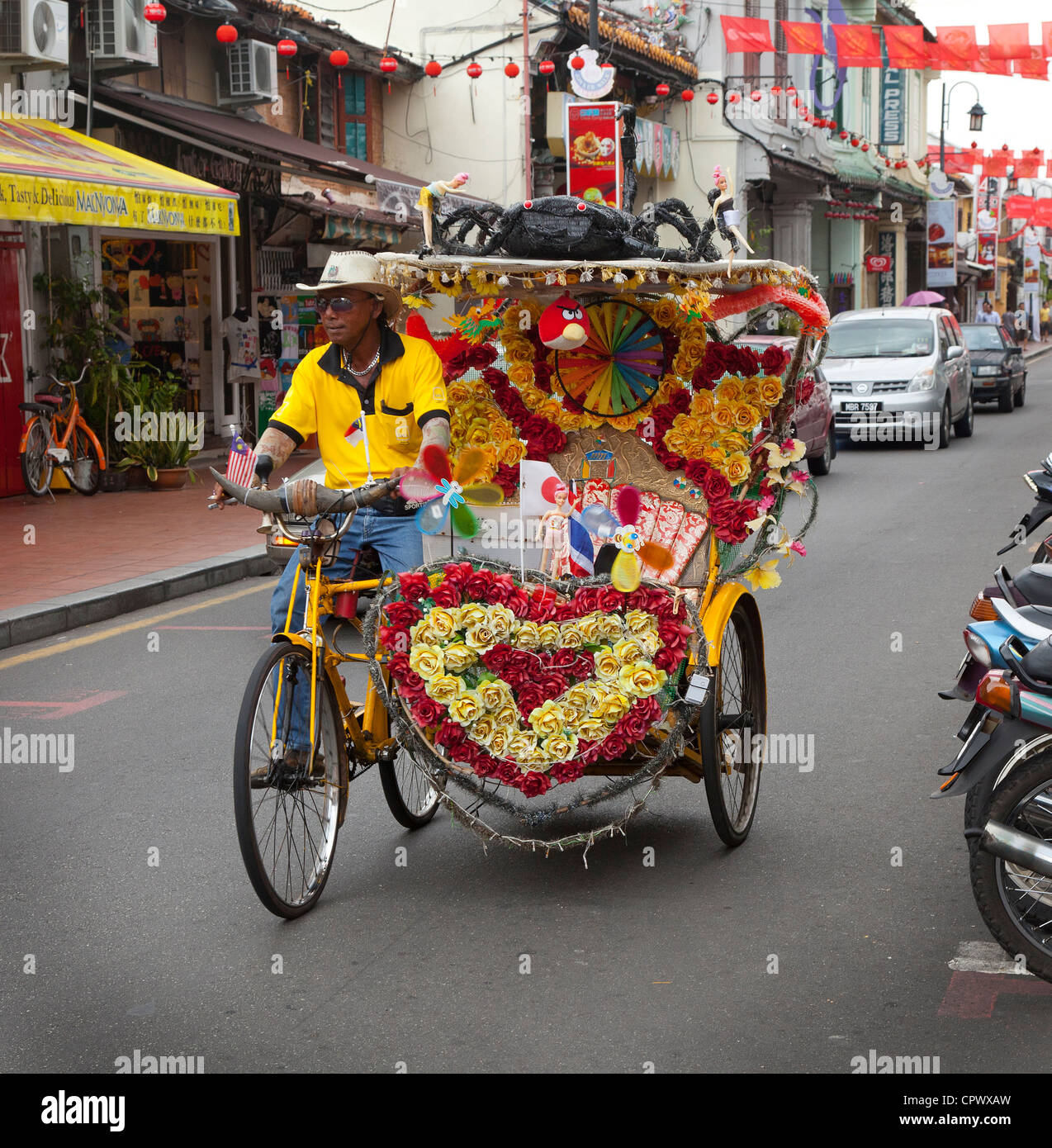 Molto colorato risciò ciclo, Melaka, Malaysia, Foto Stock