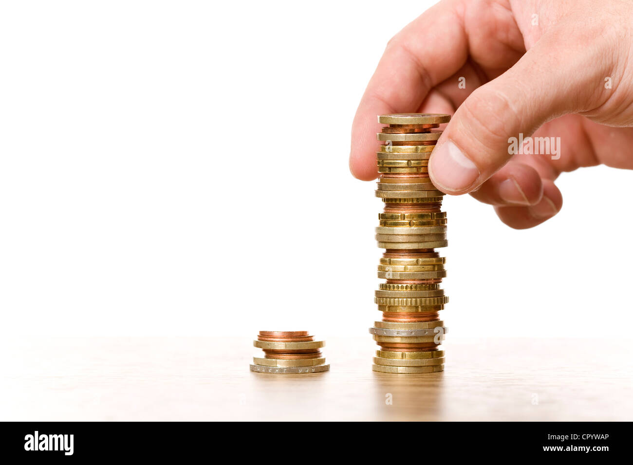 Pile di monete, immagine simbolica per il risparmio e la crescita di denaro Foto Stock