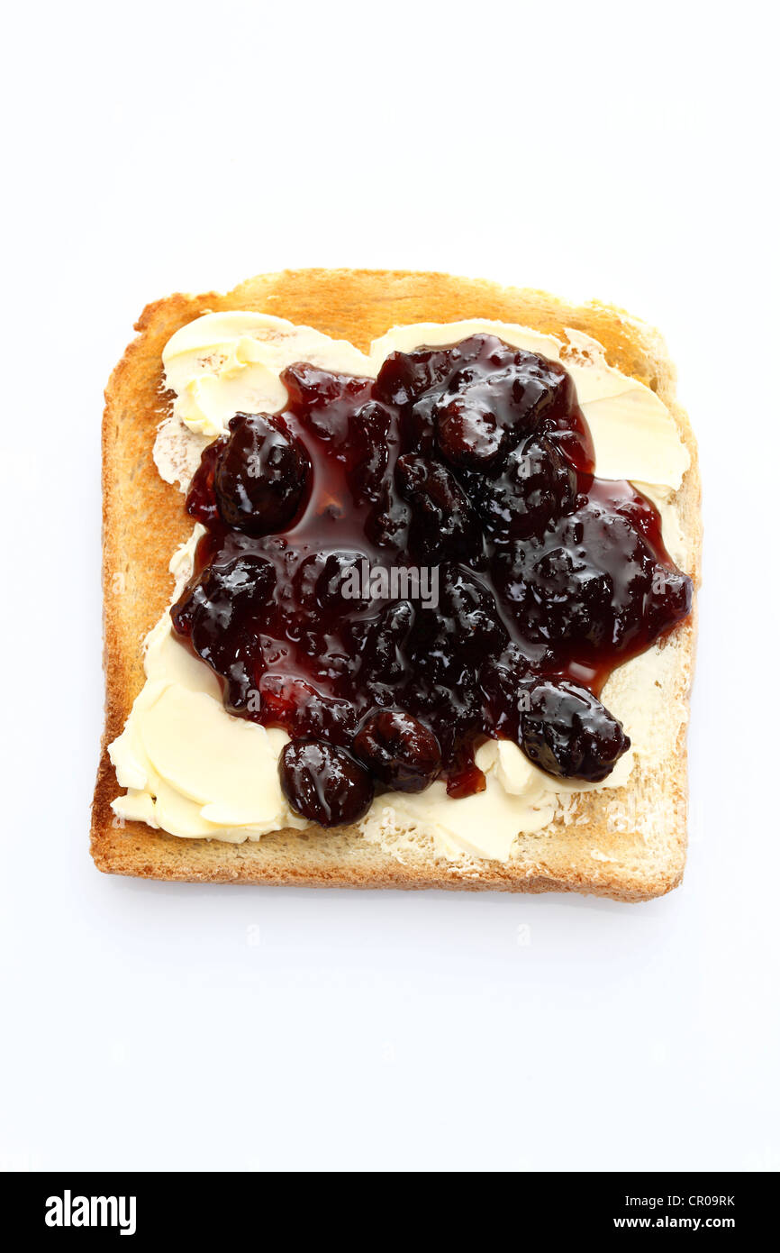 Fetta Di Pane Tostato Tostato Fetta Di Pane Con Marmellata Di Ciliege Foto Stock Alamy