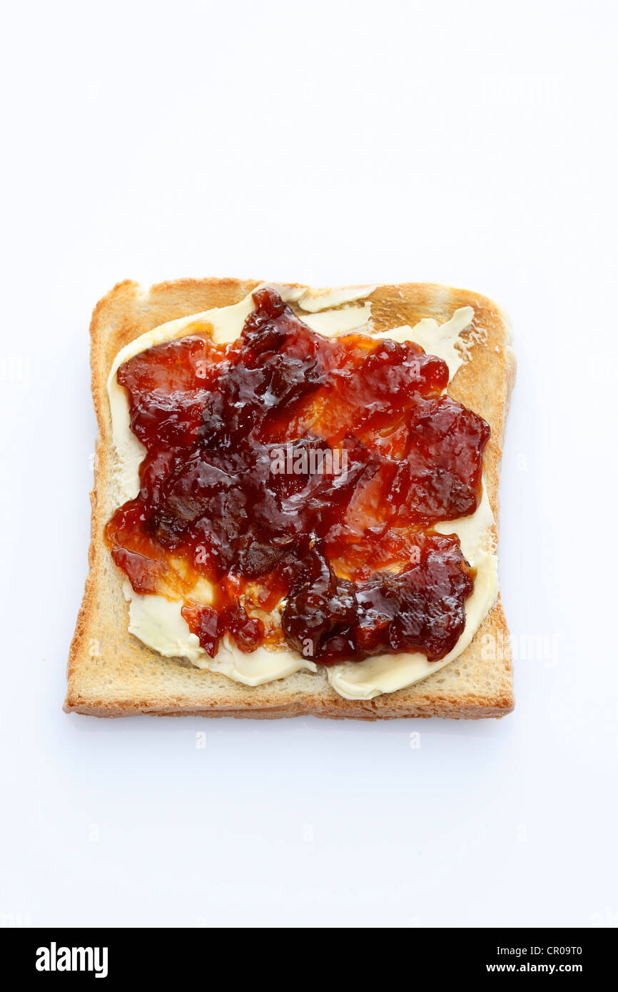 Fetta di pane tostato, tostato fetta di pane con rosa canina-marmellata di mele Foto Stock