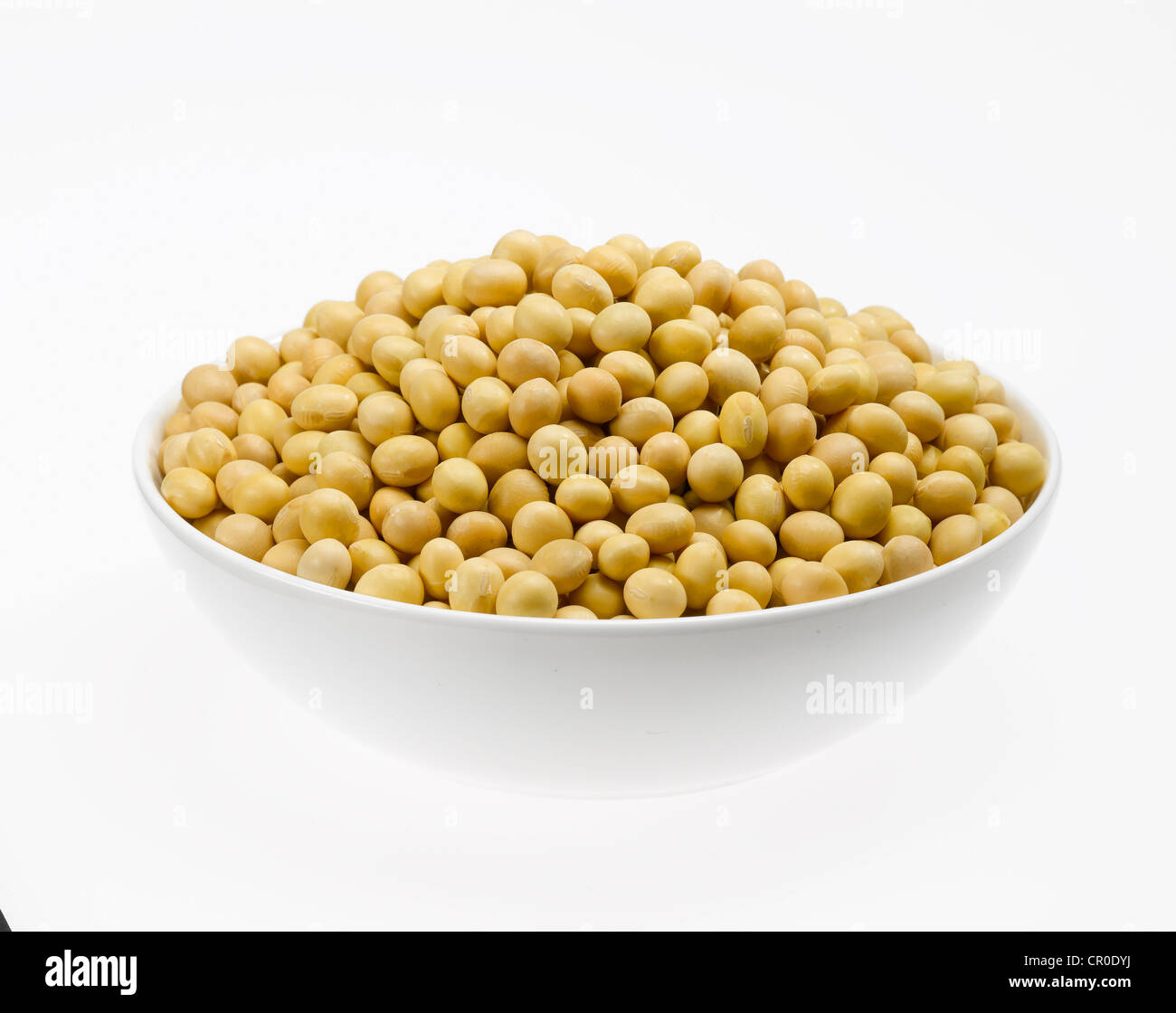 Fagioli di soia gialla nel recipiente Foto stock - Alamy